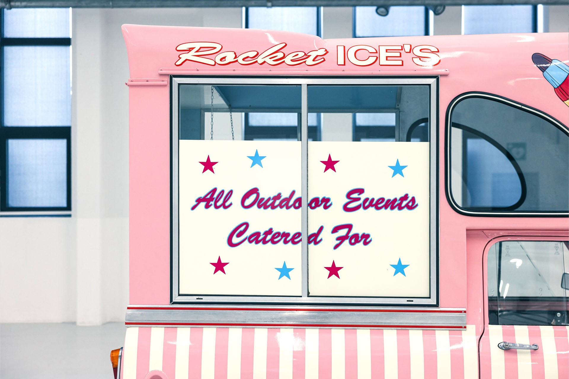A photo of the the badge and the cockpit – with a small washbasin – of the Mini Ice Cream Van.